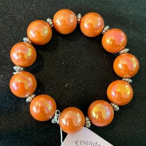 Garold Miller brownish Orange stretch bracelet with silver separators
